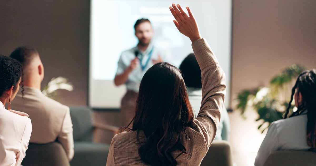 International audience at a professional conference, symbolizing global reach